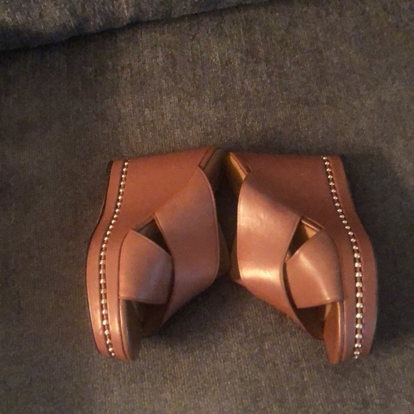 Coach leather slip in shoes.  I am a 7.5 and they fit me and are so comfortable! - Picture 2 of 7